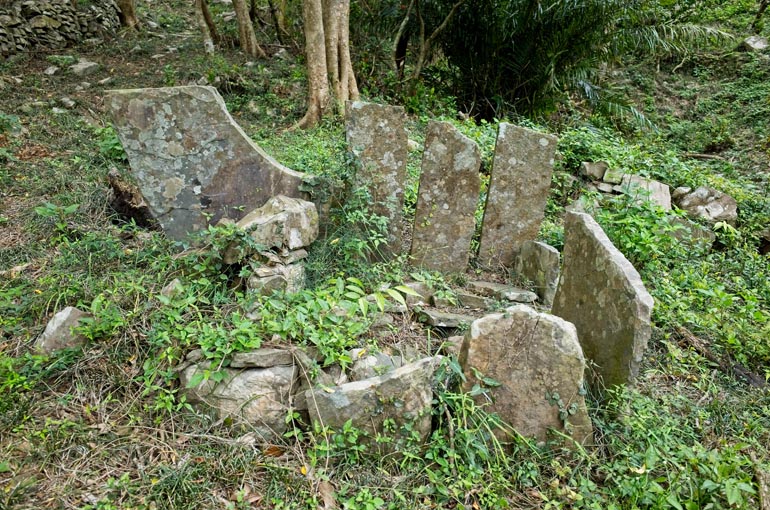 Many thin stones standing upright in a circular pattern