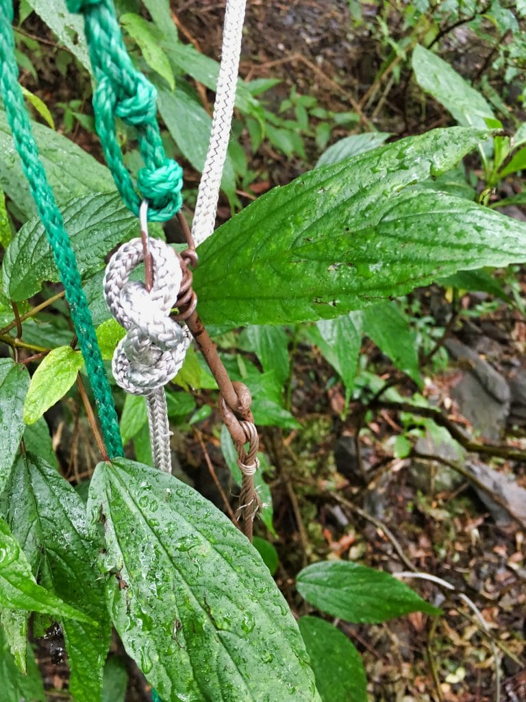 Rope tied to metal for snare trap