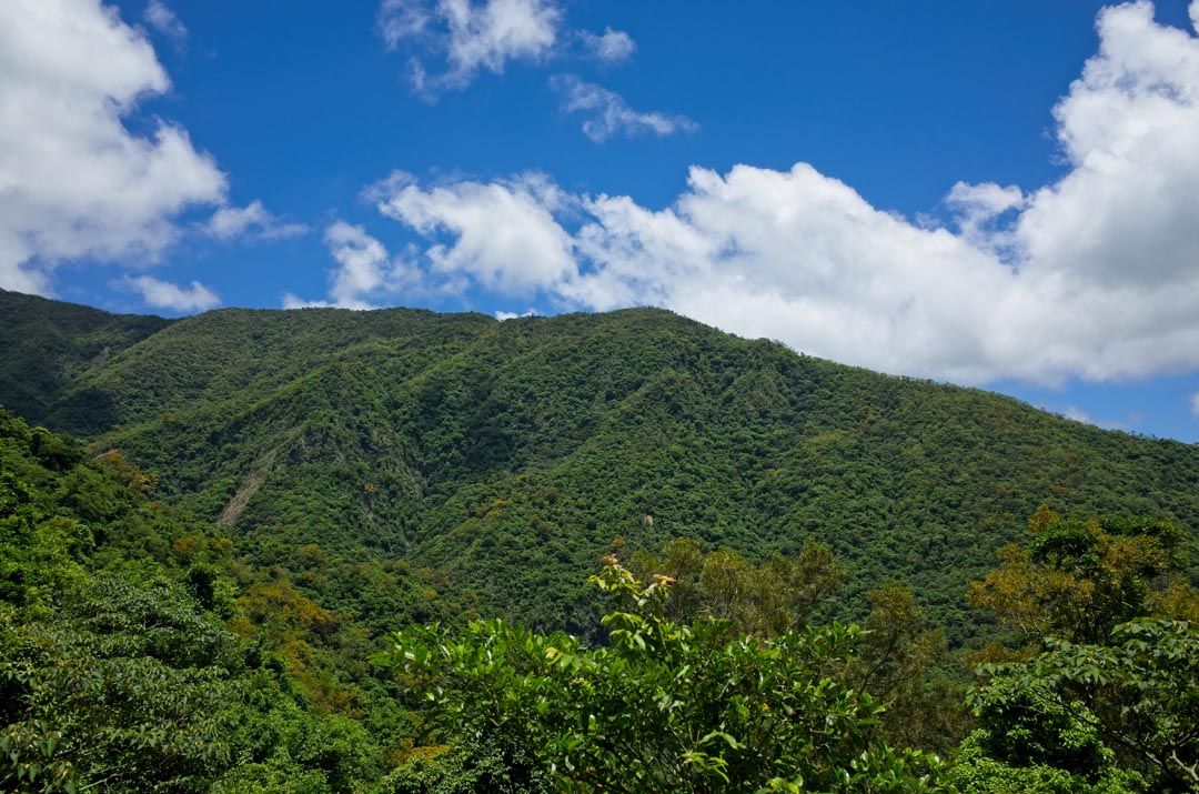 Mountain landscape with blue skies and clouds