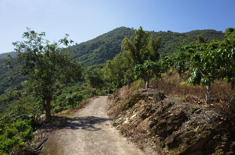 Old mountain concrete road - mountains in background