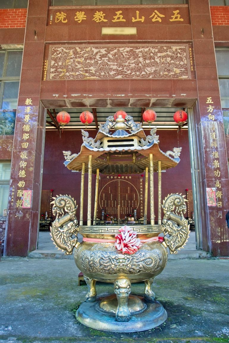Front of the temple - Large incense burner in front - main doors behind it