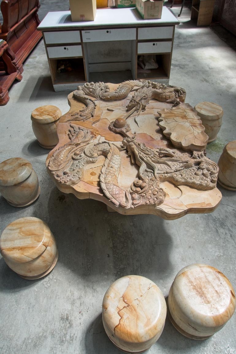 Wood table with Dragons carved into it - Several carved stools around it