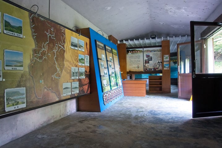 Inside visitor's center - many colorful signs telling you about the area and it's history - desk to the back