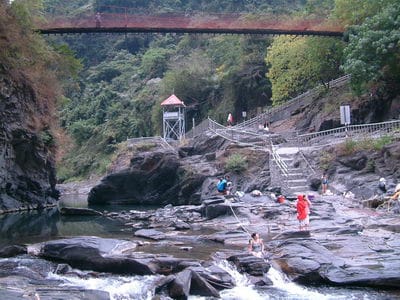 rocky river with footbridge above - ZuMuShan 足母山