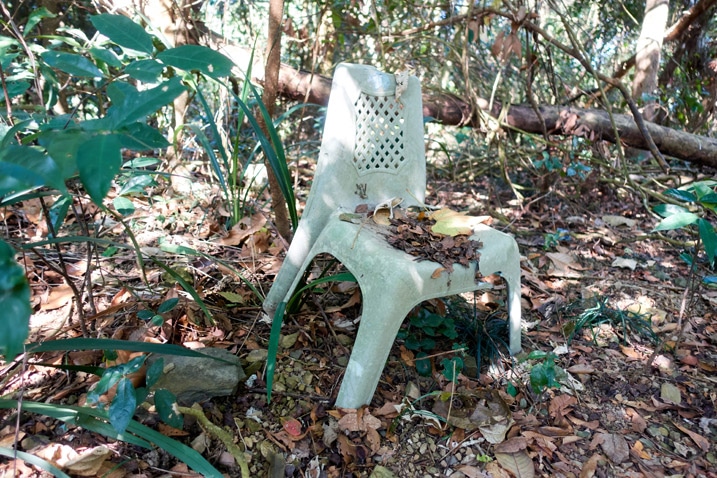 Old broken plastic chair in the forest - XinZhiShan - 新置山 Peak