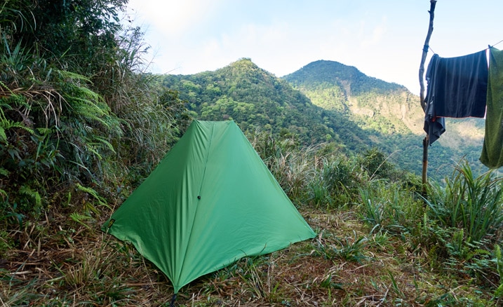 six moon designs green tent - mountains in background