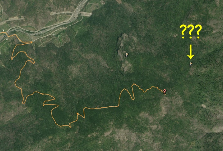 google satellite image with yellow GPX track and question marks near peak