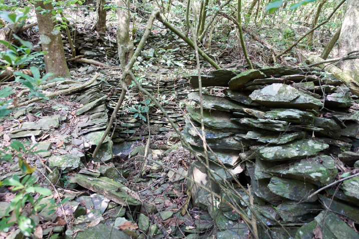 Stacked stones on mountainside